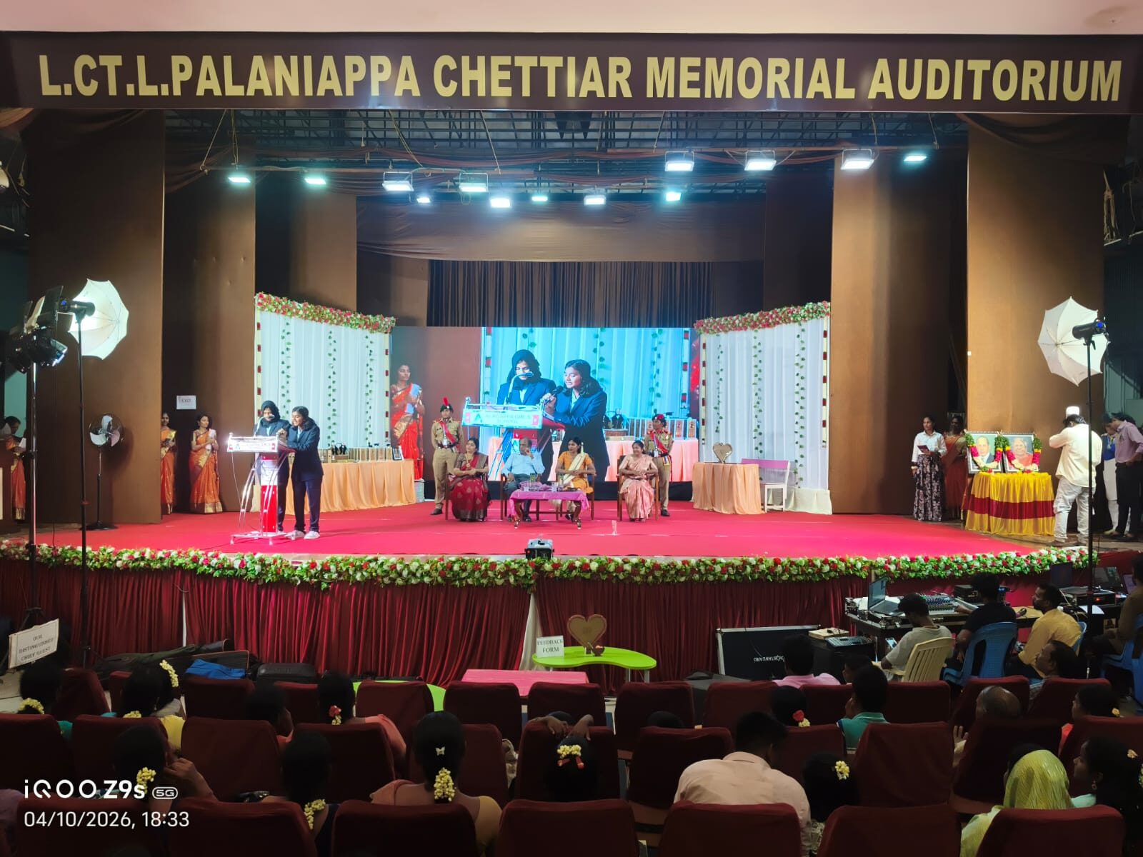 College function on an auditorium stage
