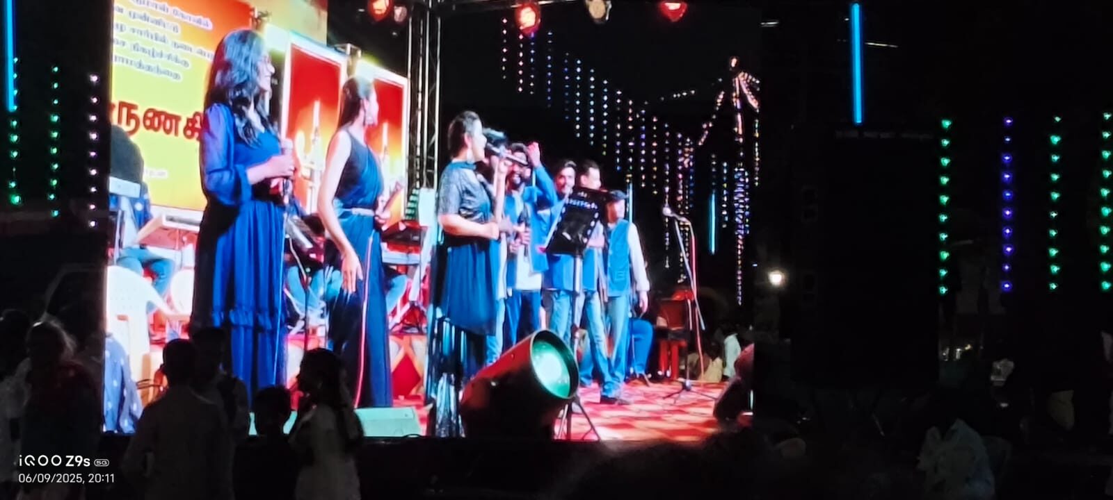 Live band performance on a lit stage
